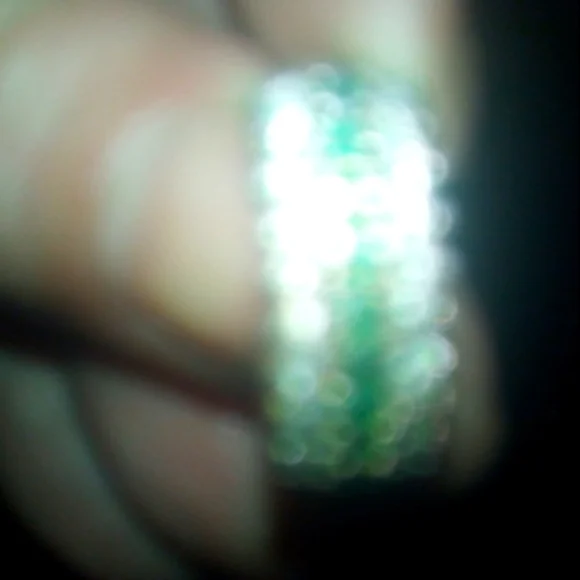 Genuine emerald and F diamond gold and silver ring